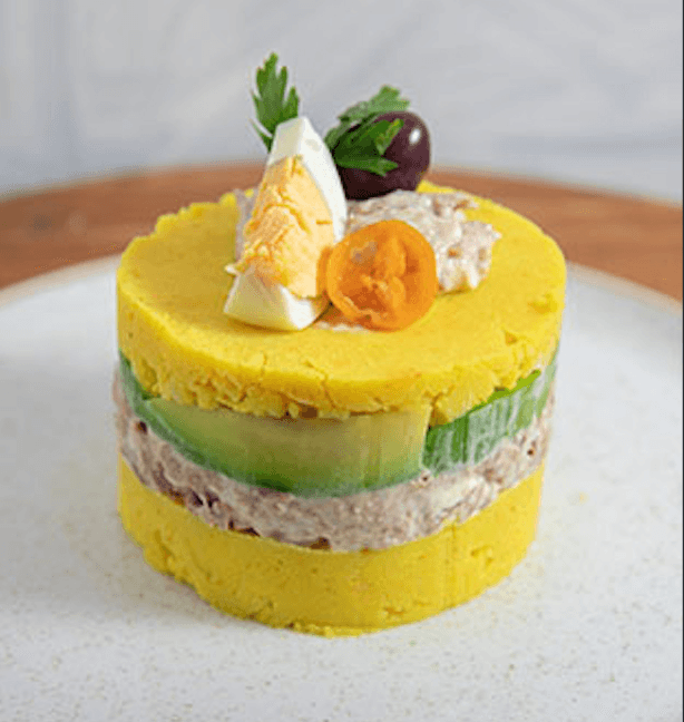 Causa limena layered potato dish in Lima