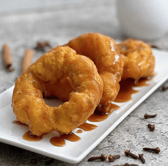 Picarones with syrup in Lima