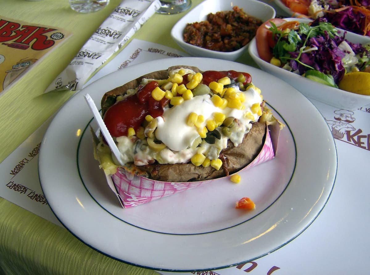 Kumpir stuffed baked potato with colorful toppings
