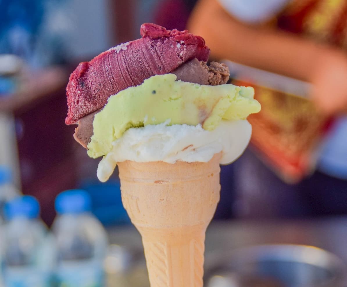 Turkish dondurma vendor serving stretchy ice cream