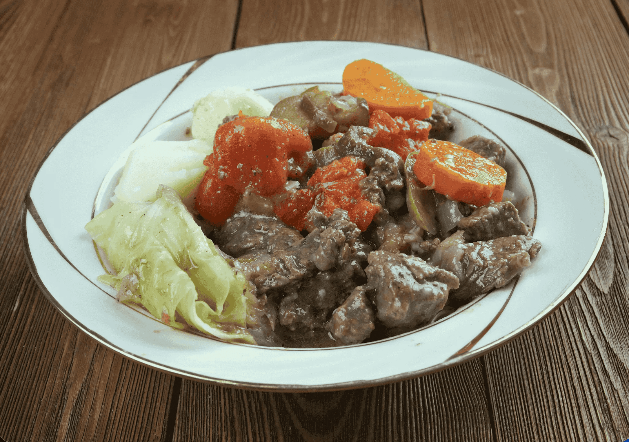 Bosanski lonac with stewed meat, cabbage, carrots, and vegetables in Mostar