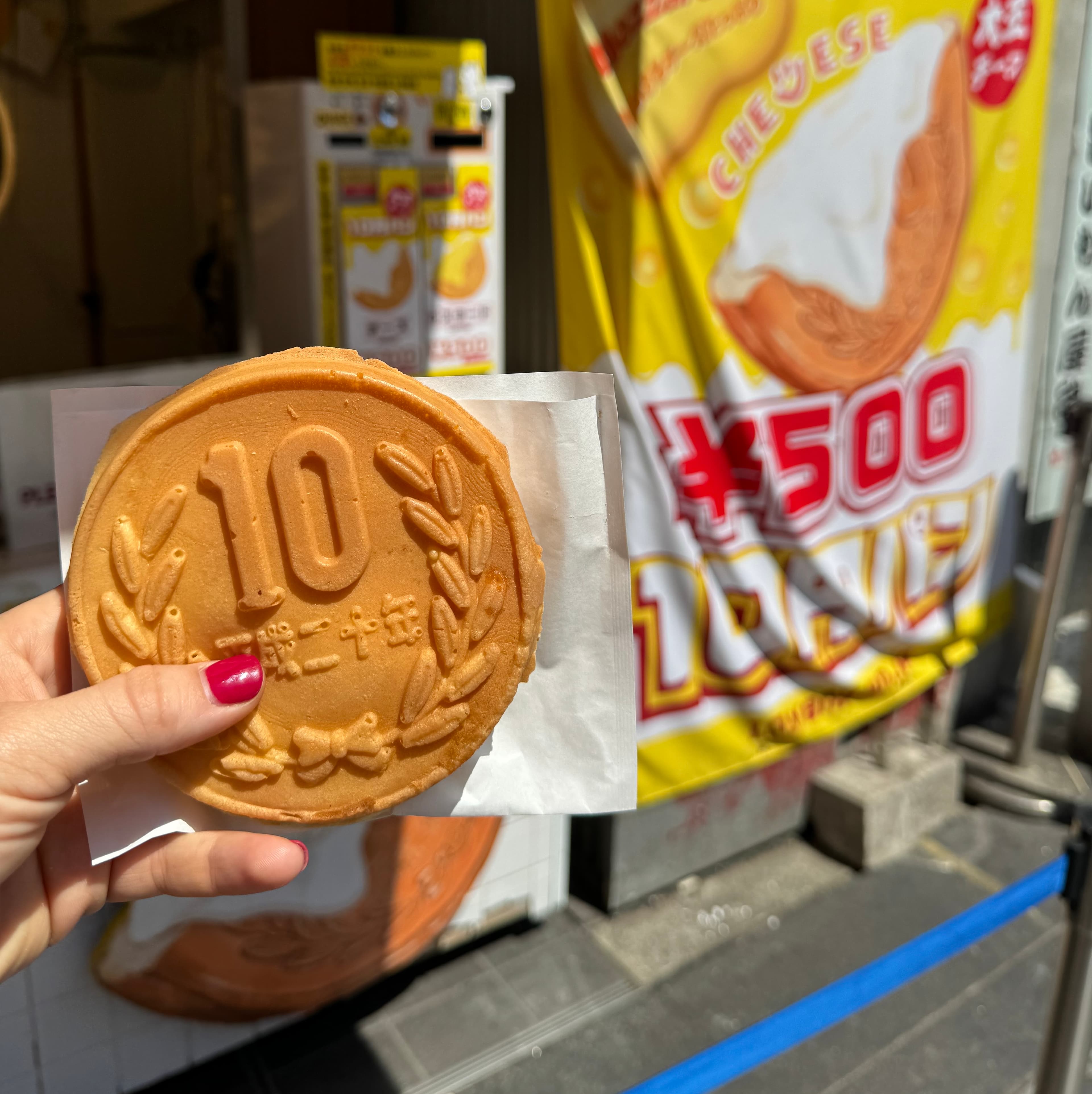 Cheese coin bread shaped like a large coin