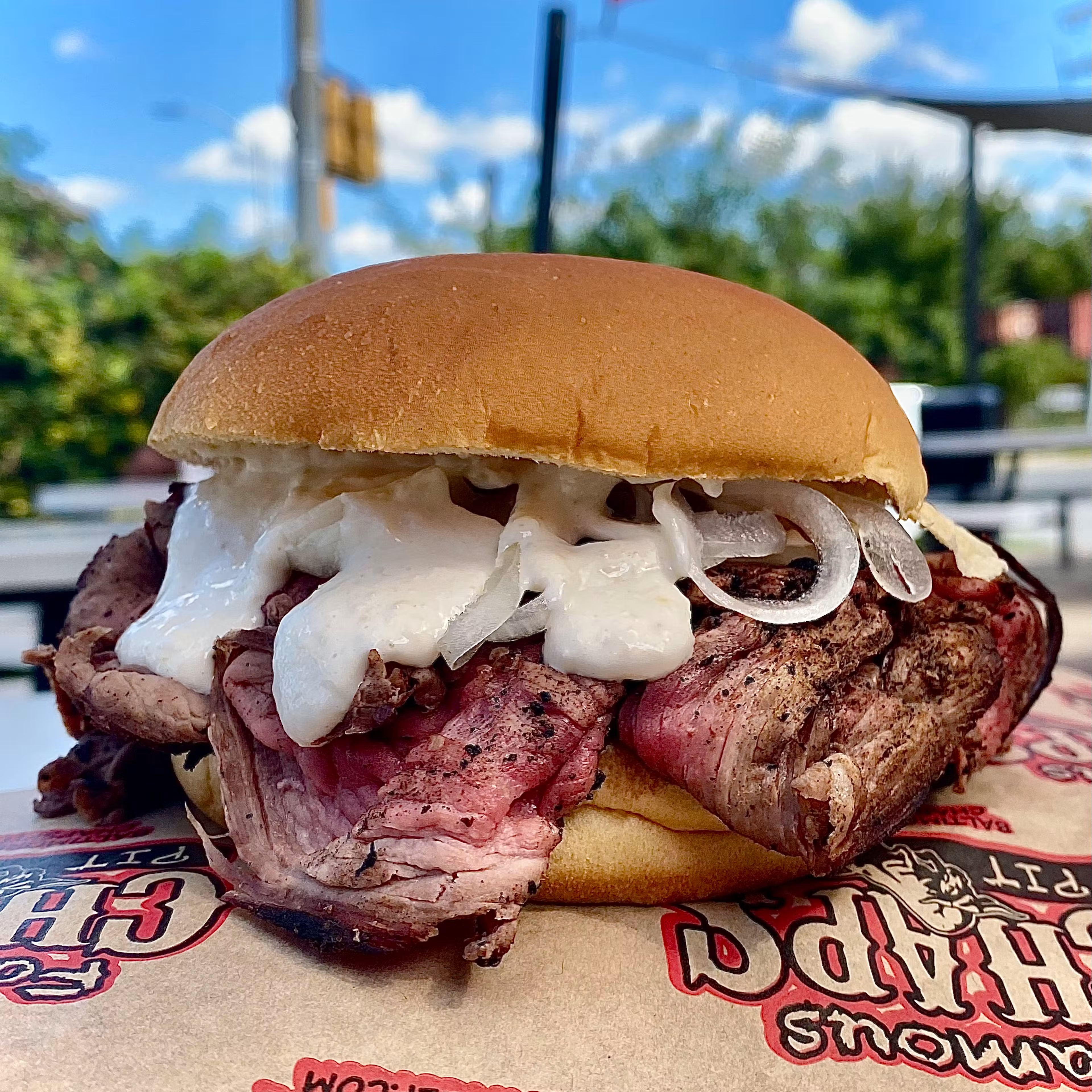 Baltimore pit beef sandwich with onions and sauce