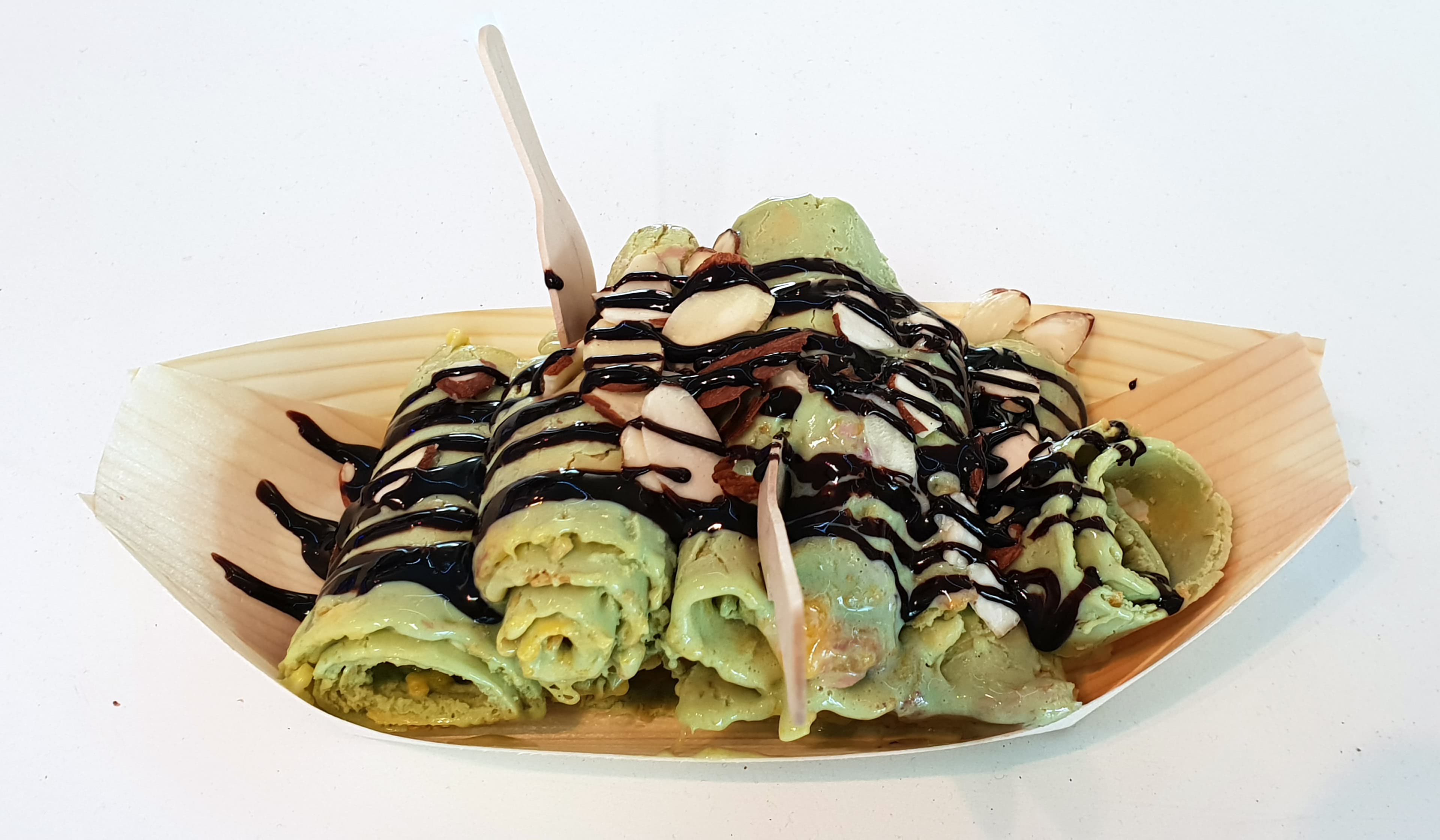 Rolled ice cream prepared on a cold plate