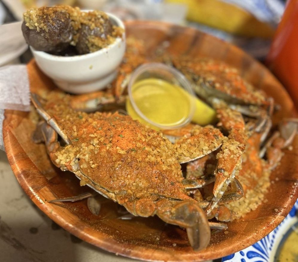 Seasoned blue crabs served on a platter with butter and lemon at the Jersey Shore