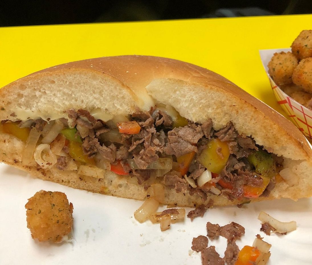 Jersey Shore cheesesteak stuffed with chopped beef, onions, peppers, and melted cheese