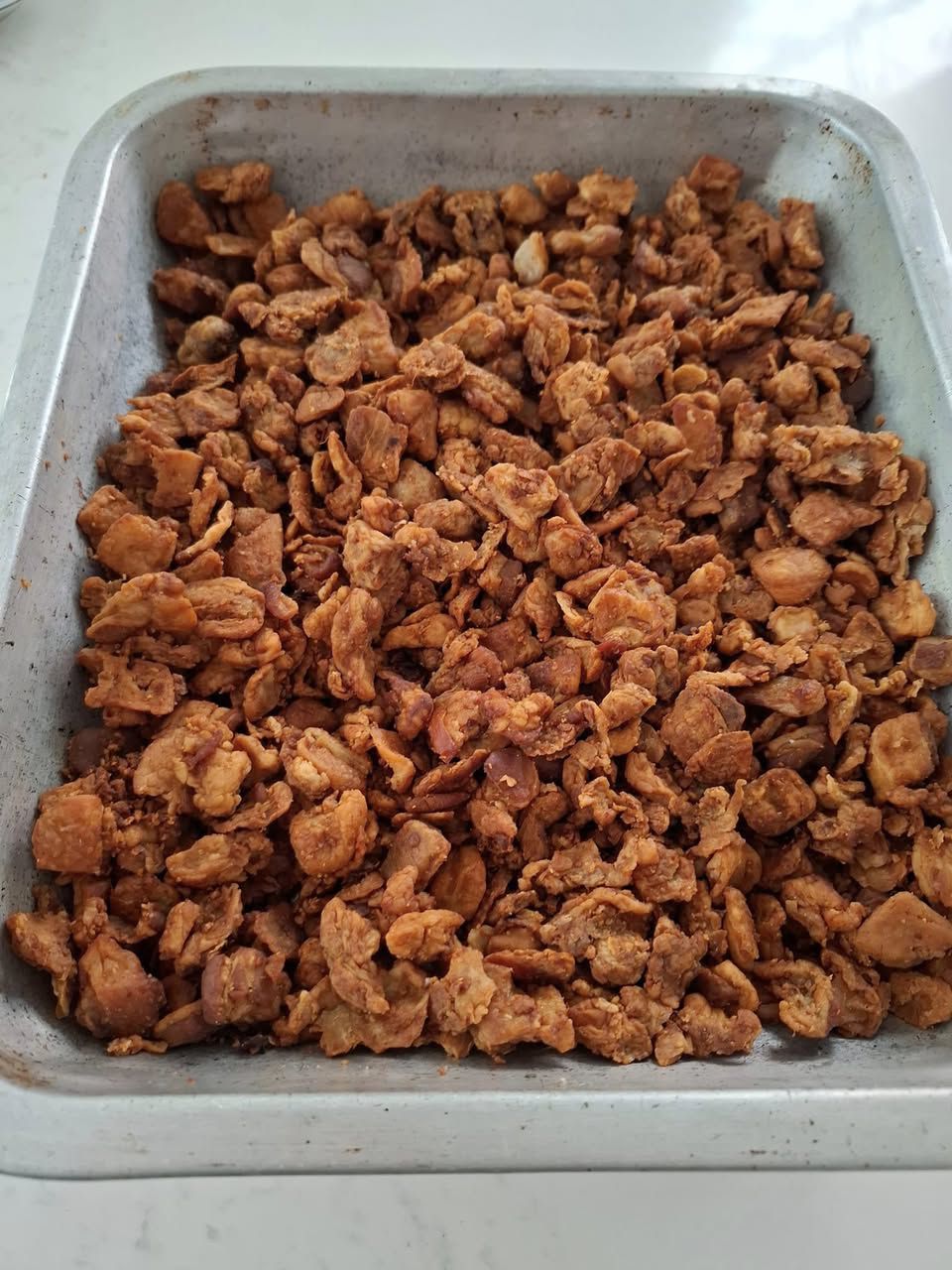 Tray of crispy Serbian čvarci pork cracklings