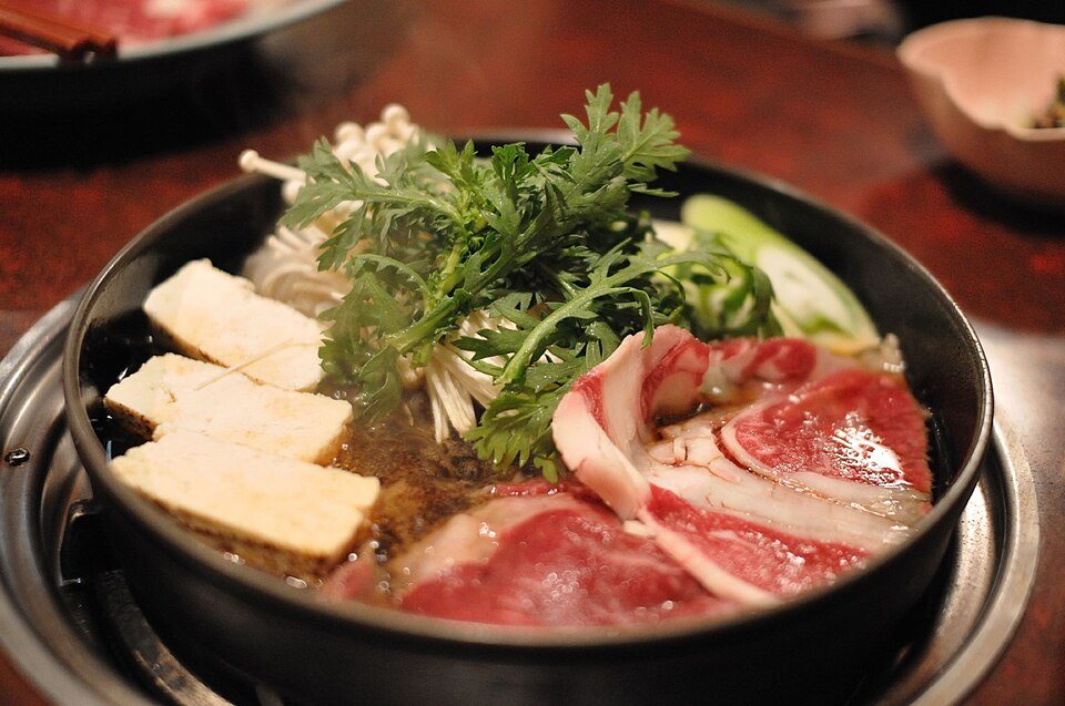 Japanese sukiyaki hot pot with beef and vegetables