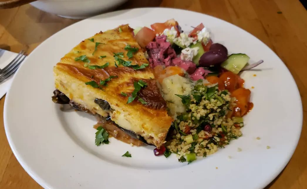 Traditional Greek moussaka served in a baking dish